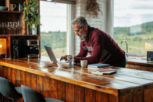 istock Senior man working at home. 2162347685
