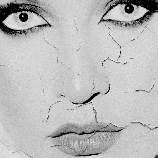istock Cracked Effect Woman Portrait 2162352896