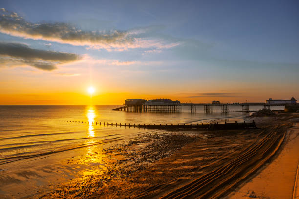 istock A beautiful sunrise over Cromer pier. 2162353131