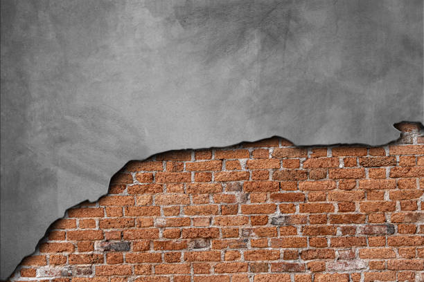 istock The walls are peeling the red bricks are visible texture background. 2162353261