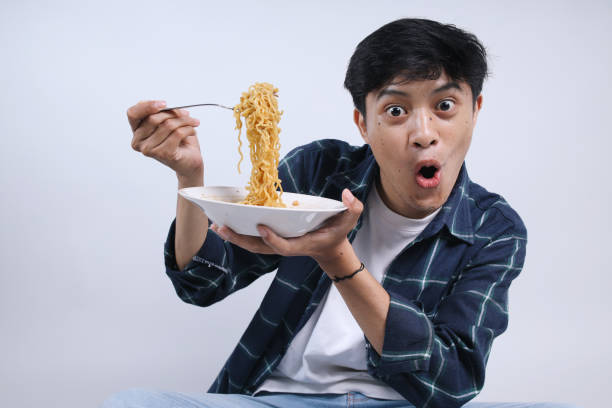 istock Eating Spicy Noodles 2162356552