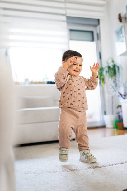 istock First steps of baby girl 2162358538