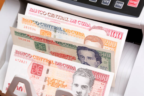 istock Cuban Peso in the counting machine 2162359215