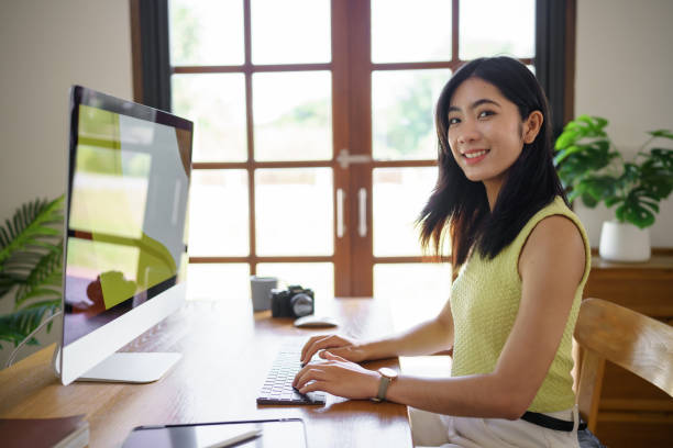 istock Graphic designer working on digital tablet and computer. Designer Asian Woman artist drawing on graphic tablet  Artist Creative Designer sketch graphic drawing creative 2162359536