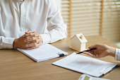 approved-stamp-with-business-people-signing-contract-making-deal-with-real-estate-consultant.jpg?b=1&s=170x170&k=20&c=EC-cHs6jpN2c_VQ4_bllBYL9aVTtLNoP8ziwRqfS8F8=