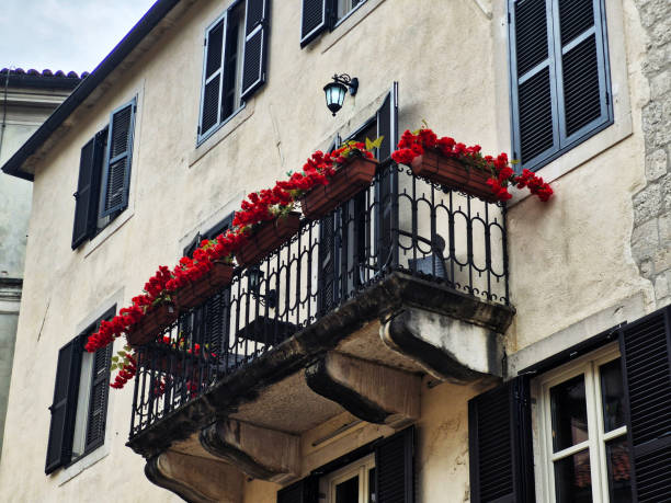 An example of a balcony from Montenegrin architecture decorated with flowers