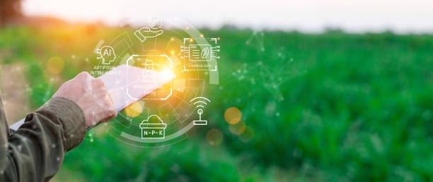 istock Farmers use agricultural technology in data analysis tablets and image icons. New technologies in agricultural business concepts. Men use tablets to research and develop plant varieties, agricultural 2162360985