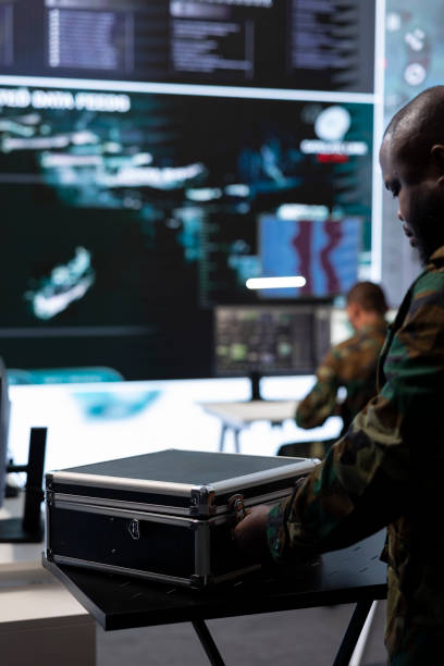 istock Army soldier handles satellite radar real time data on laptop in command post 2162363610