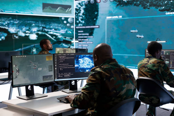 istock Military specialist in high tech control center managing satellite surveillance 2162363632