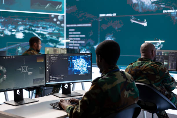 istock Military professionals in a mission control center employs modern technology 2162363658
