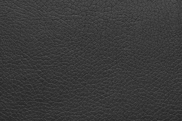 istock Natural, genuine black leather texture, structure of glossy leatherette macro background 2162363788