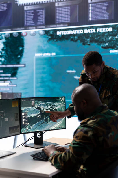 istock In a high tech military office, soldiers team analyze real time data collected 2162363953