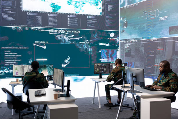 istock Military personnel in a modern command center handle critical information 2162363996