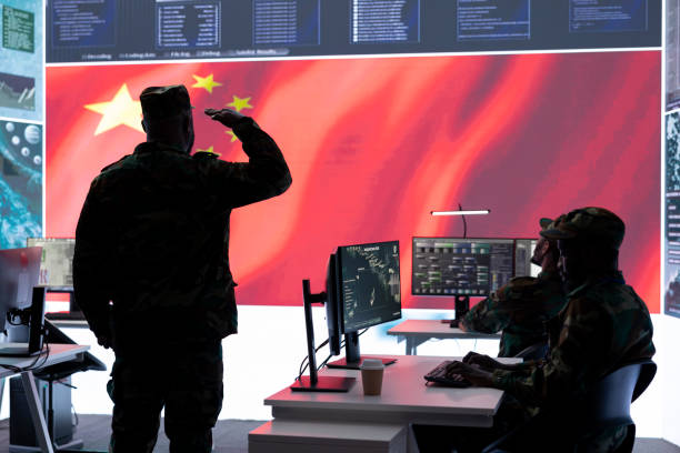 istock Military officer in uniform monitors critical data on big screen 2162364653