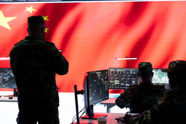 istock Military command officer analyzing data on computers in a n army base of operations 2162364739