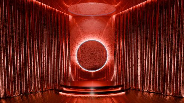 istock Dimly lit interior space with red velvet curtains on either side of a circular light fixture and a small stage. 3d render 2162364785
