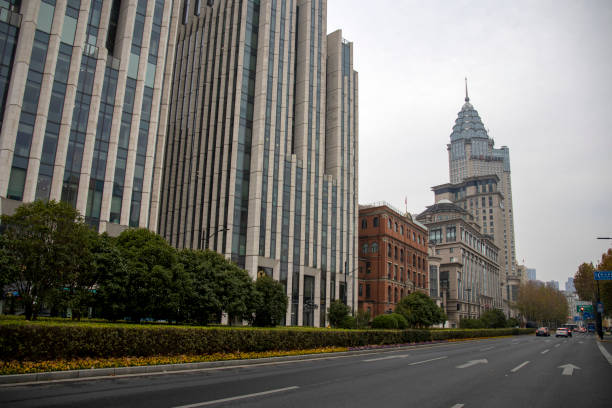 Shanghai, China- 4 Dec, 2023: Old building along the Bund in Shanghai. Street scene of excellent historical buildings with city road