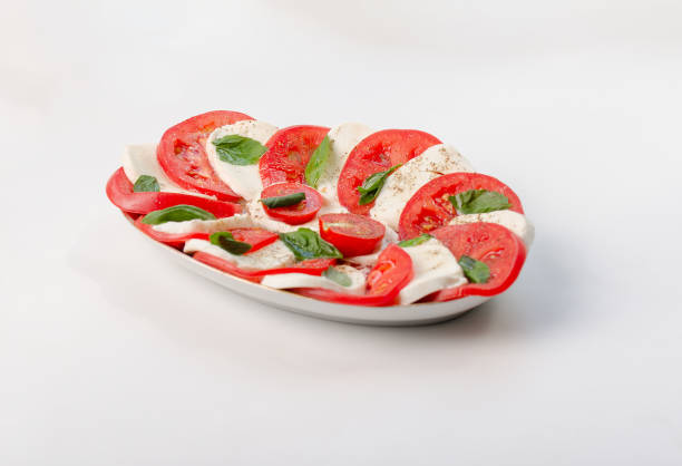 istock A white plate with a red and white salad 2162366041