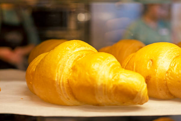 semi-finished croissants in a cafe window
