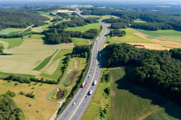 istock Highway in hilly landscape 2162377902