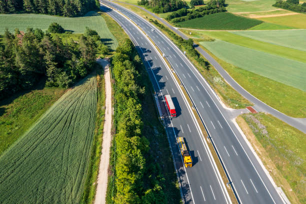istock Aerial view of trucks on highway 2162378132