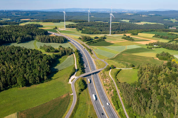 istock Highway and wind turbines 2162378419