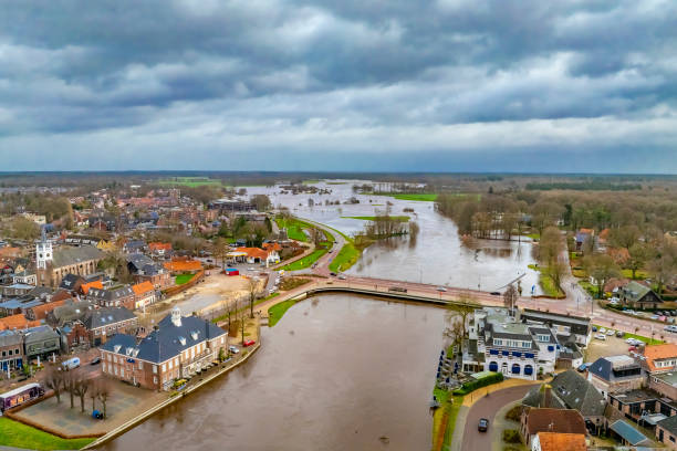 istock Vecht river high water level flooding in Ommen drone view 2162385787