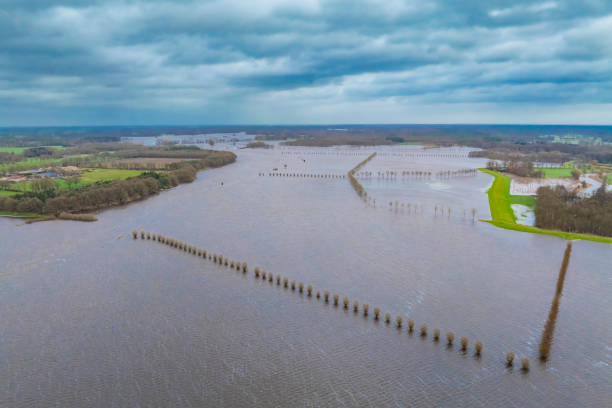 High water level in the river Vecht at the Dalfsen in the Dutch Vechtdal region in Overijssel, The Netherlands. The river is overflowing on the floodplains after heavy rainfal upstream in The Netherlands and Germany in December 2023.