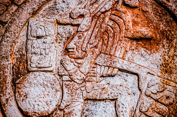 istock A stone carving of a man with a sword and a shield 2162386103