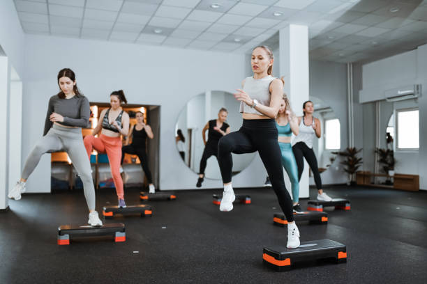istock Athletic Females Doing Dance Workout In Gym 2162388880