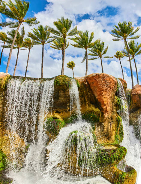 Vertical image with long exposure of waterfall during the day