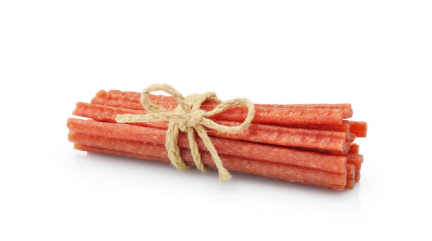 istock Dried cured sausages cabanossi isolated on white 2162392037