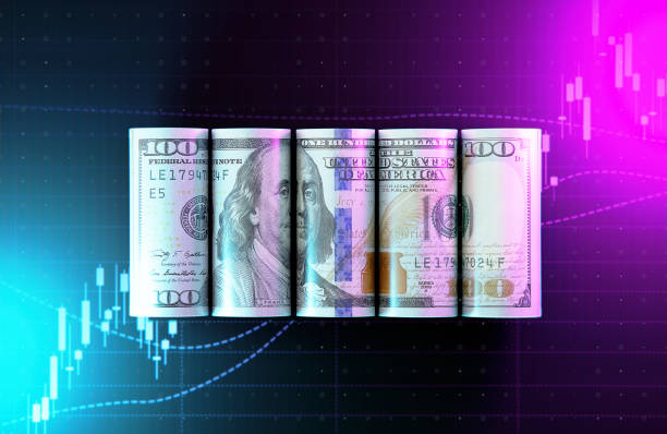 istock One Hundred American Dollar Bills Over Neon Colored Financial Chart Background 2162393495