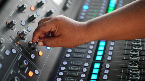 istock hands control the sound mixer 2162397845