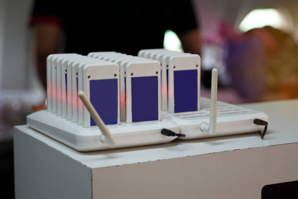 istock queue pager is a technology that increases the efficiency of customer service in the ordering, checkout, and voice prompts from the queue pager for customers to self-pick up their food. 2162398800