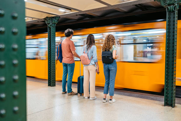 istock Three Friends Waiting For A Subway Train In Budapest In Hungary 2162399911