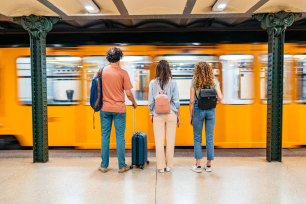 istock Three Friends Waiting For A Subway Train In Budapest In Hungary 2162399992