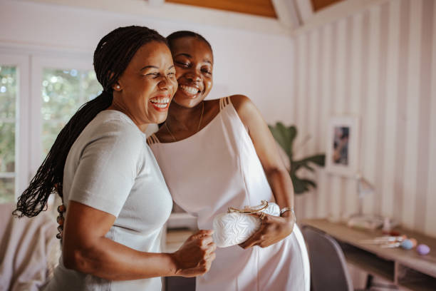 istock Mother and daughter sharing a special moment before prom night. 2162402549