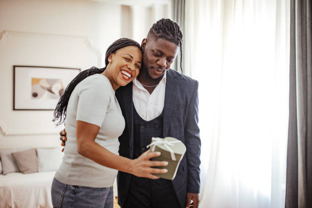 istock Mother and son sharing a joyful moment before his prom night 2162402804