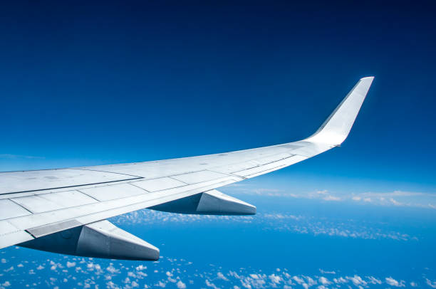 istock Skyward Bound, capturing the Majestic Airplane Wing from Your Window Seat 2162403599