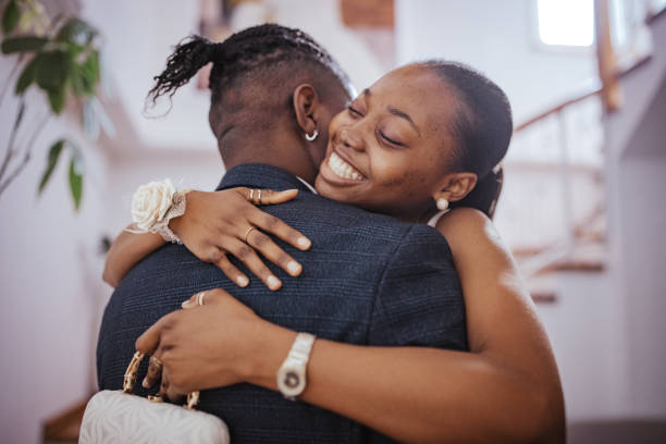 istock Prom attendees in formal attire sharing a tender embrace 2162404235