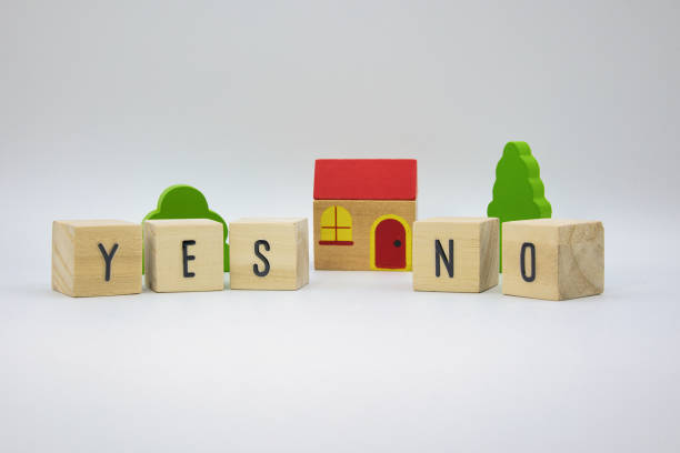 istock Choose YES, NO wooden letter blocks 2162405516