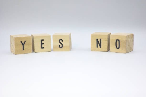 istock Choose YES, NO wooden letter blocks 2162406167