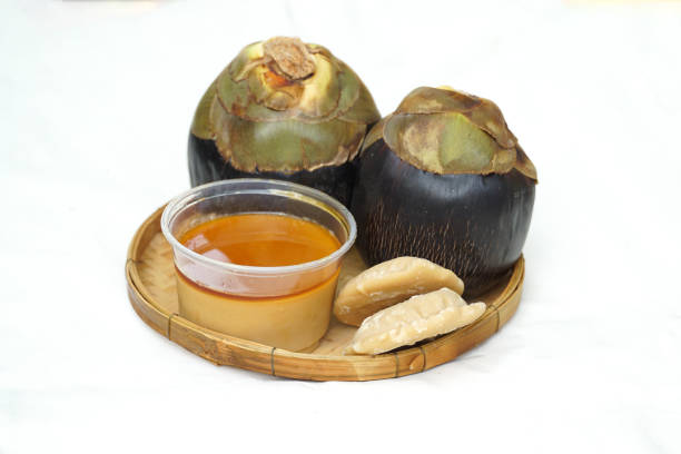 Isolated toddy palm and Palmyra palm sugar, both types in bamboo baskets. on a white background. Soft and selective focus.