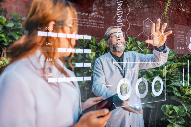 istock Coworkers analyzing data in the greenhouse 2162411045