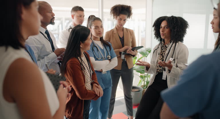 Medical group, meeting and doctor in hospital, training and coaching in clinic. Team, nurse and people together for speech, planning strategy and collaboration, cooperation and healthcare internship