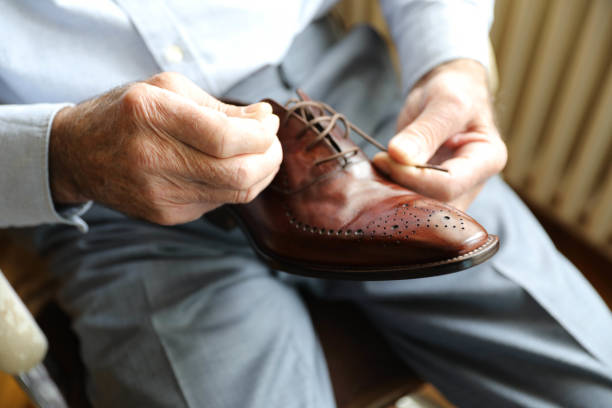 istock A hand placing a shoelace 2162414681