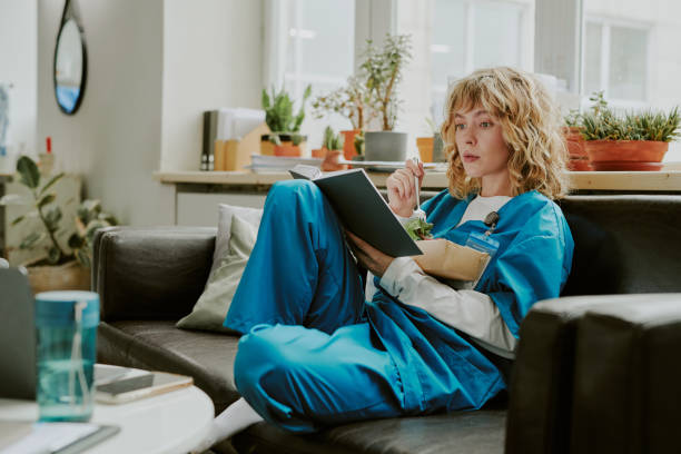 Young Paramedic Enjoying Novel