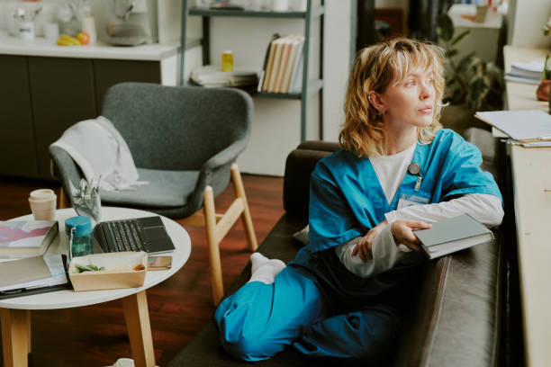 istock Good Looking Female Paramedic Looking Out Window 2162415585