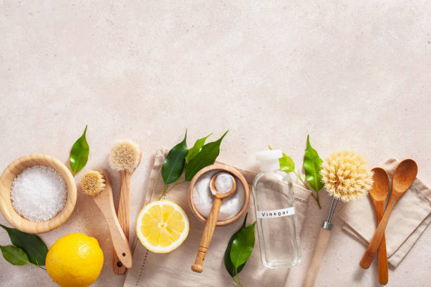 zero waste eco friendly cleaning and kitchen concept. wooden brushes, lemon, baking soda, vinegar